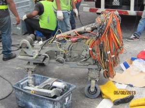 This machine works like a robot goes into the sewer pipe and does all the repair works control via distant monitor